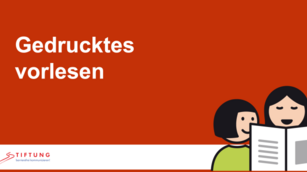 PowerPointfolie mit Aufschrift Gedrucktes vorlesen, dazu ein METACOM Symbol mit der Darstellung einer Vorlesesituation